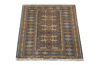 Persian Torkaman accent rug in cream and navy, view 4 of 9