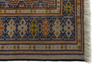 Persian Torkaman accent rug in cream and navy, view 5 of 9