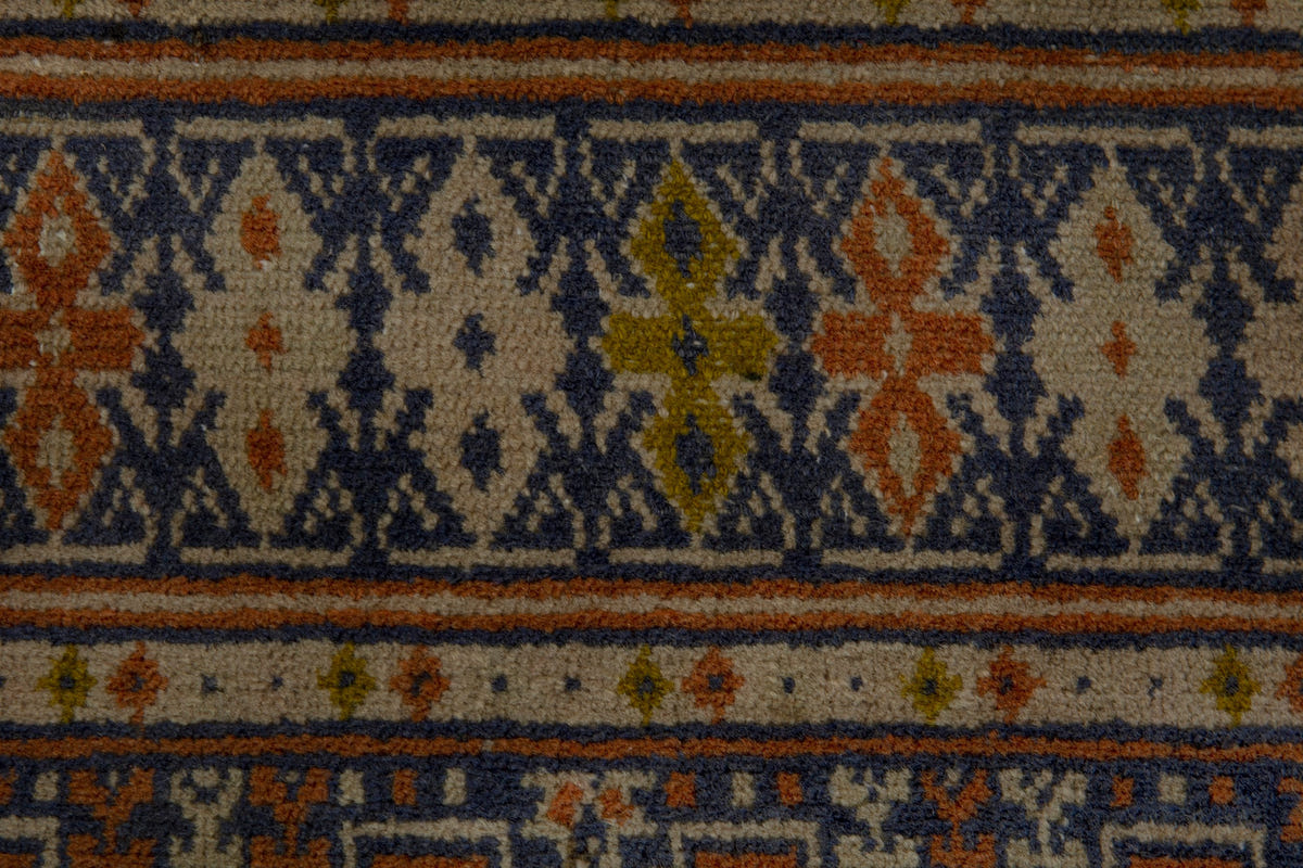 Persian Torkaman accent rug in cream and navy, view 8 of 9