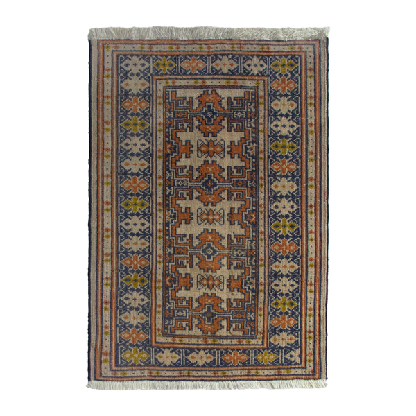 Persian Torkaman accent rug in cream and navy, 2'1" x 2'6"