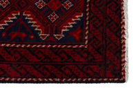 Persian Baluch accent rug in deep red and black, view 5 of 9