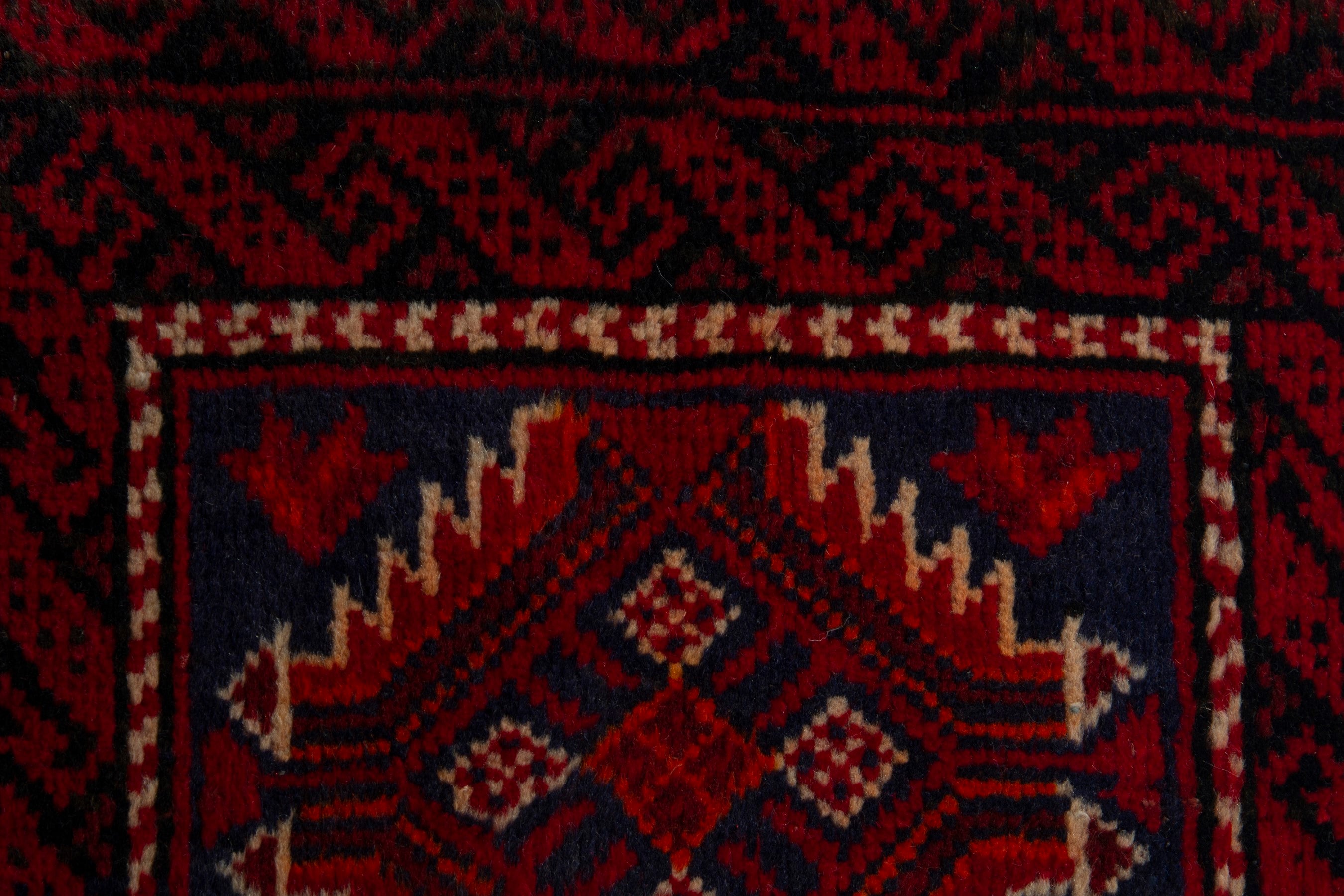 Persian Baluch accent rug in deep red and black, view 6 of 8