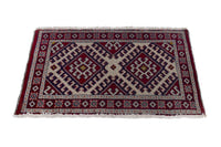 Persian Torkaman accent rug in burgundy and cream, view 4 of 10