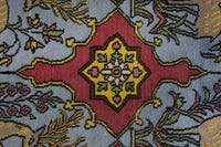 Persian Shahreza accent rug in faded red and dusty blue, view 7 of 10