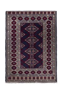 Persian Torkaman accent rug in navy and cream, view 2 of 9