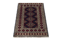 Persian Torkaman accent rug in navy and cream, view 4 of 9