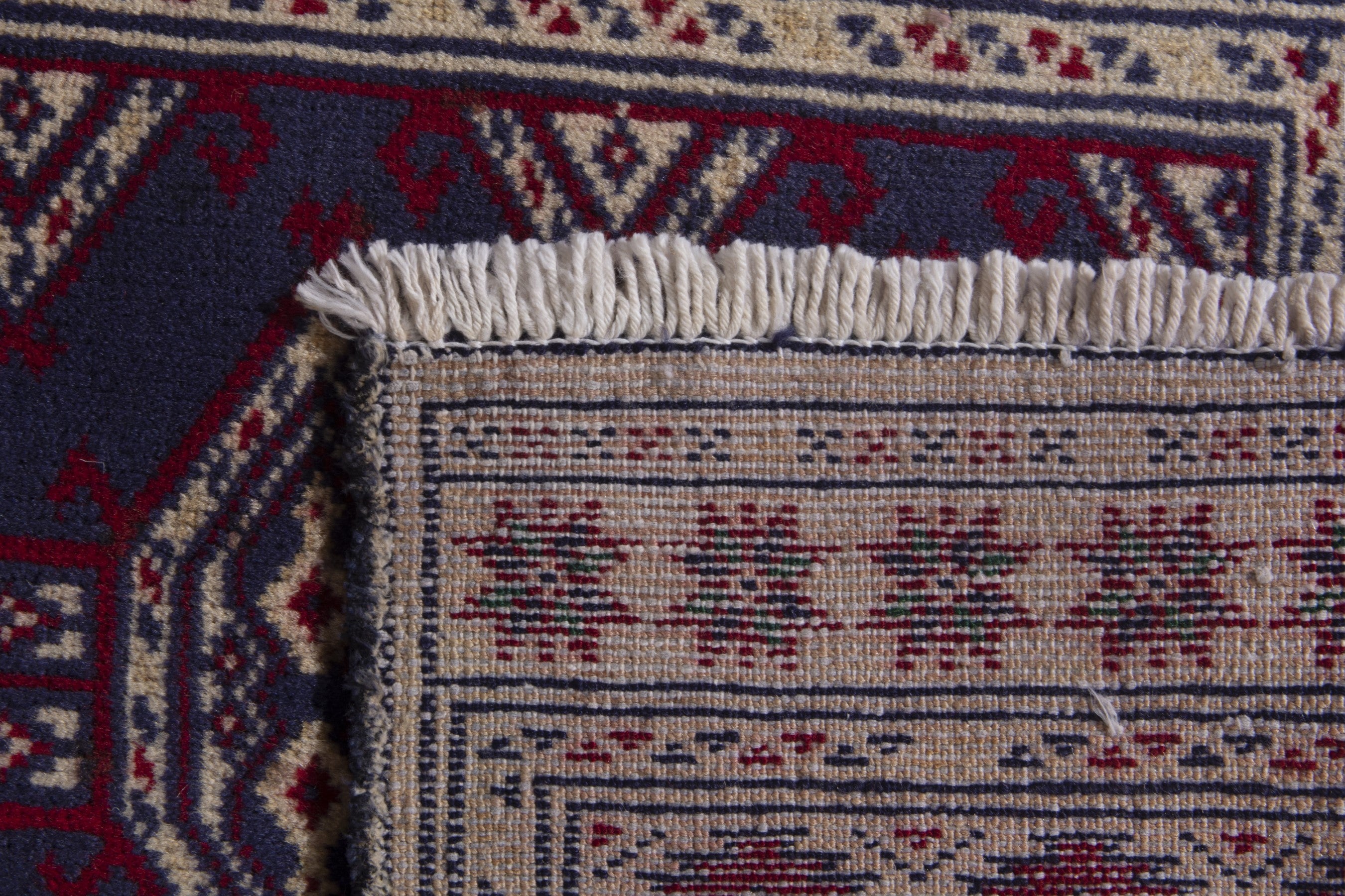 Persian Torkaman accent rug in navy and cream, view 8 of 8