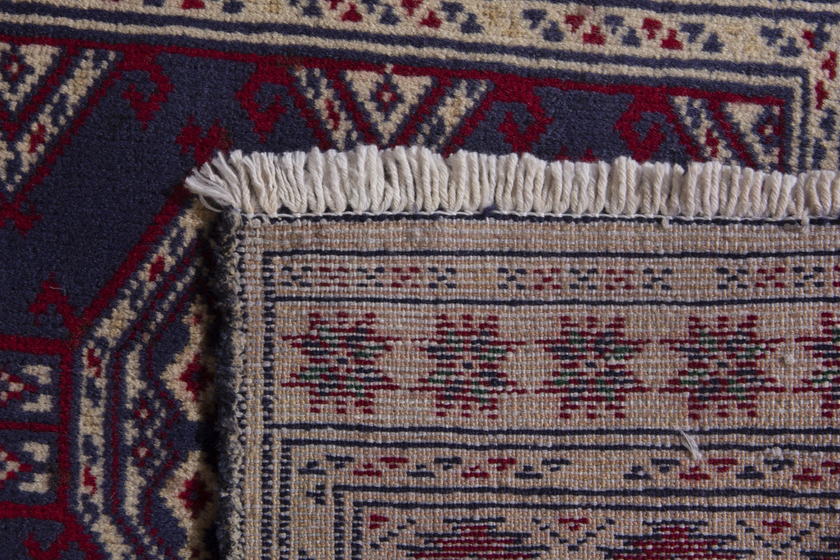Persian Torkaman accent rug in navy and cream, view 9 of 9