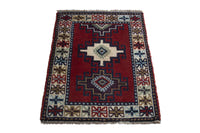 Persian Ghoochan accent rug in deep red and cream, view 3 of 10