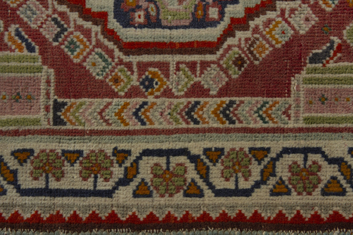 Persian Shiraz accent rug in faded red and navy, view 8 of 10