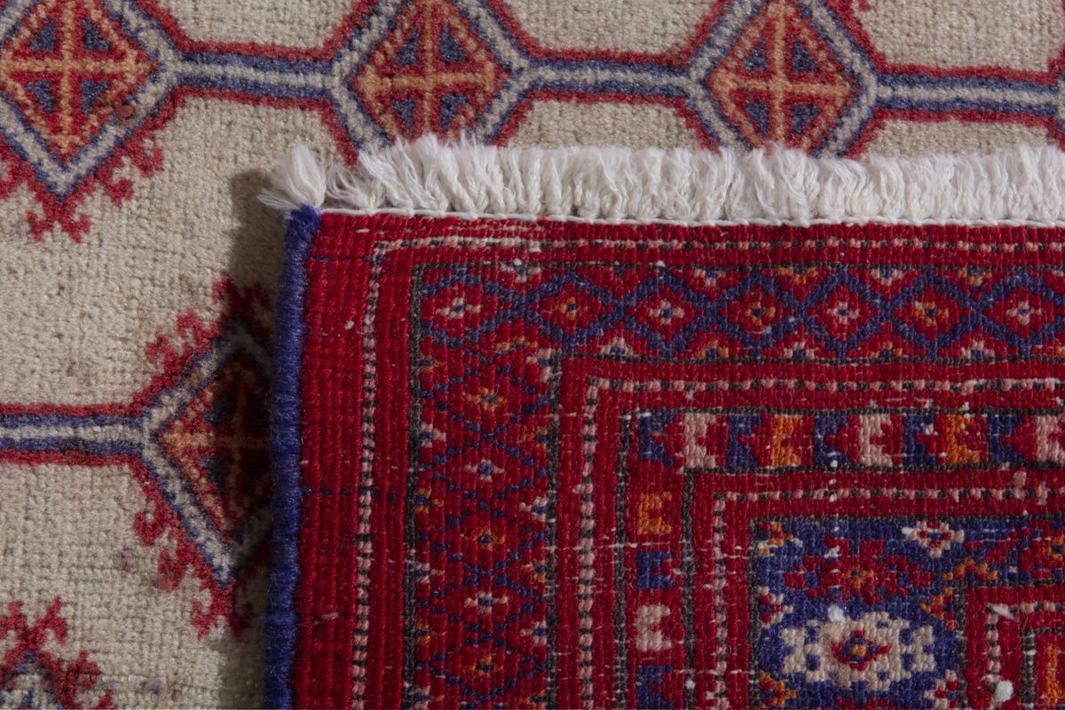 Persian Baluch accent rug in cream and deep red, view 9 of 9