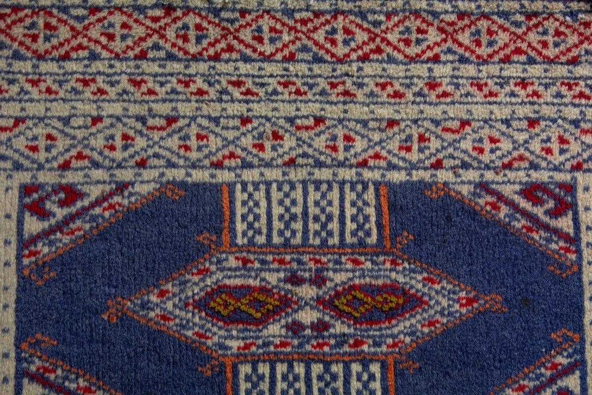 Persian Torkaman accent rug in denim and cream, view 8 of 9