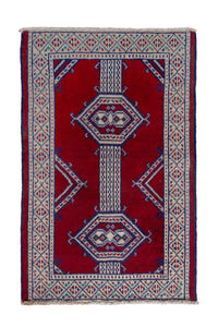 Persian Torkaman accent rug in deep red and cream, view 2 of 8