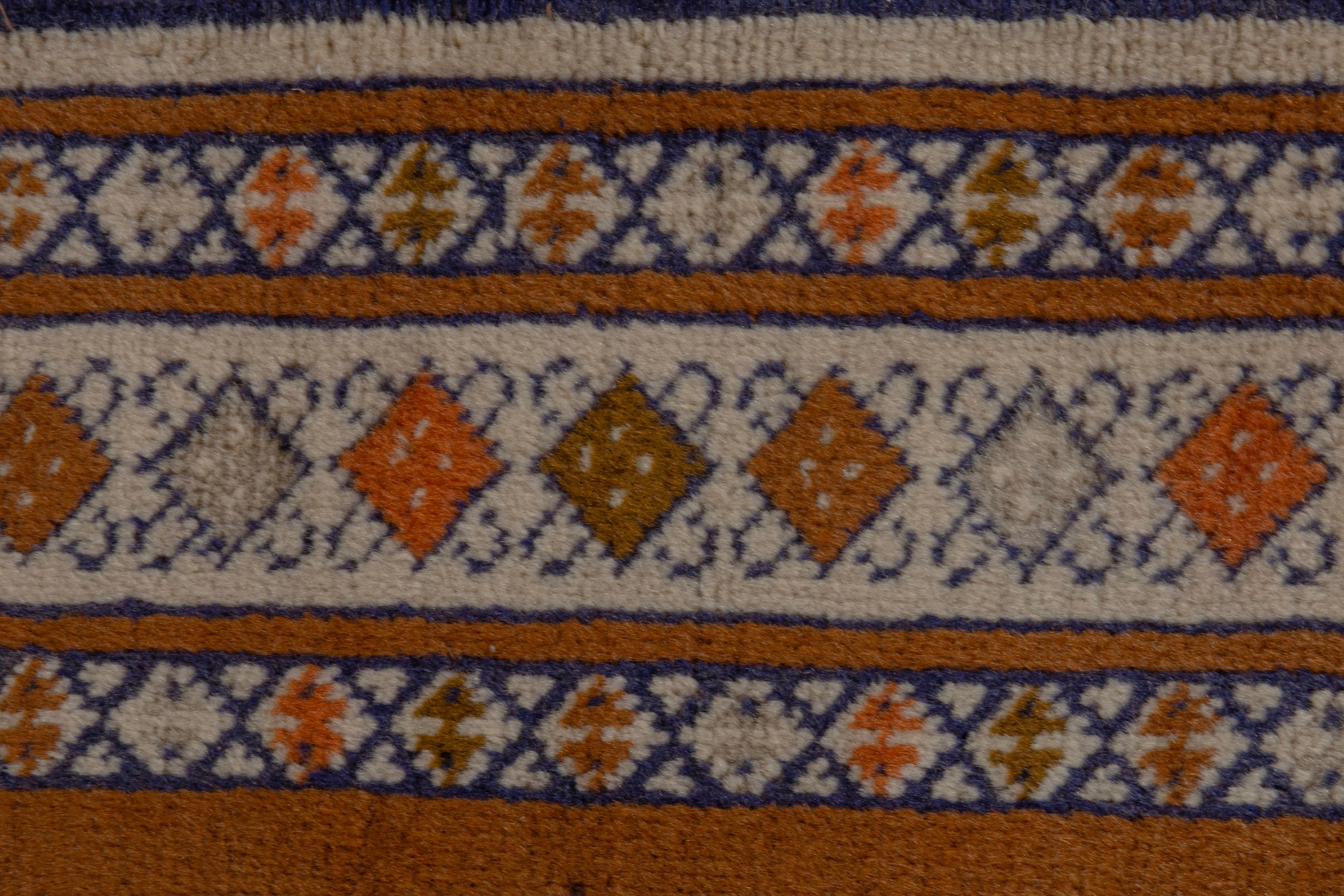Persian Baluch accent rug in rust and blue, view 5 of 7