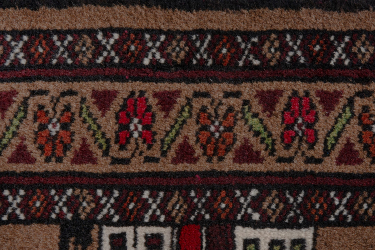 Persian Torkaman accent rug in tan and burgundy, view 9 of 10