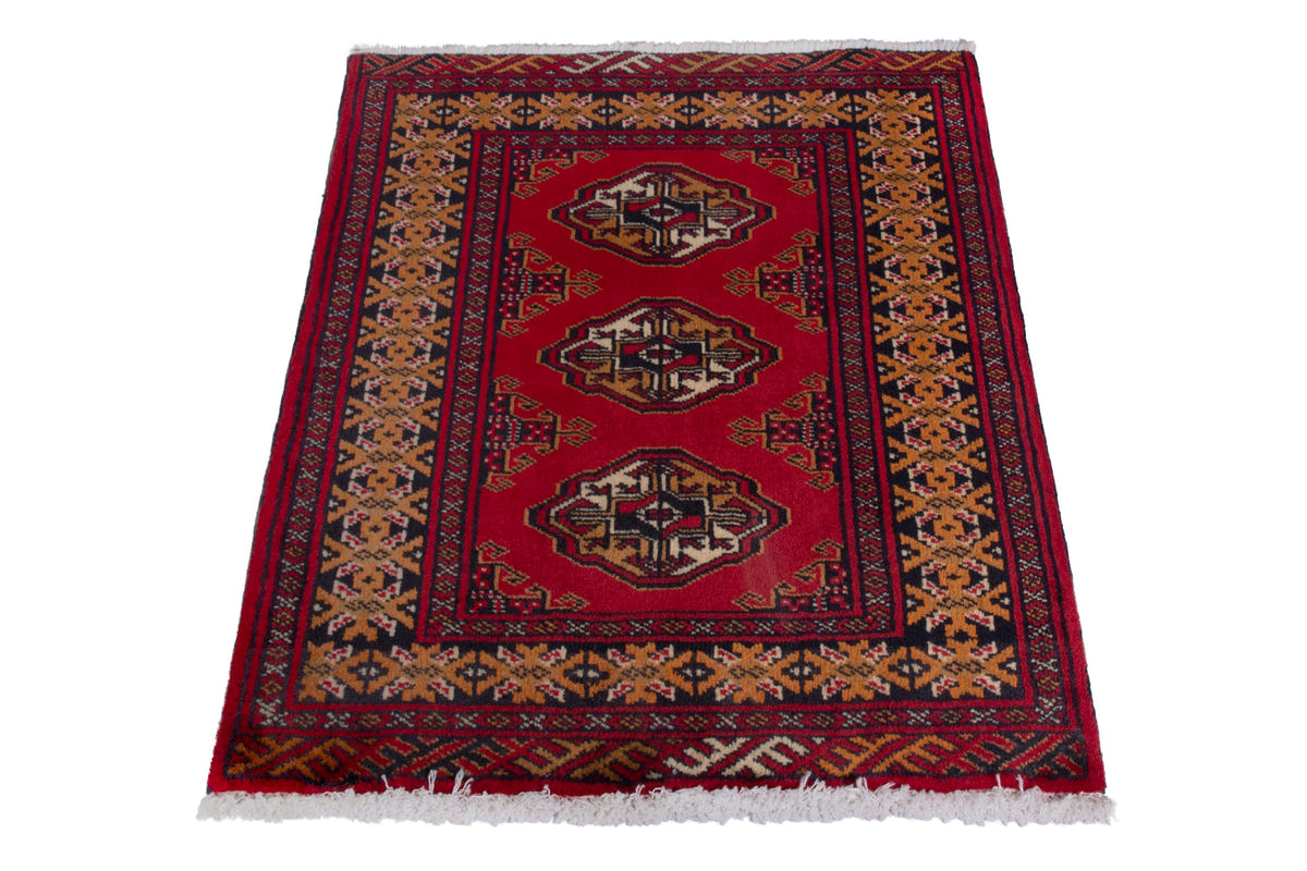 Persian Torkaman accent rug in deep red and ochre, view 4 of 9