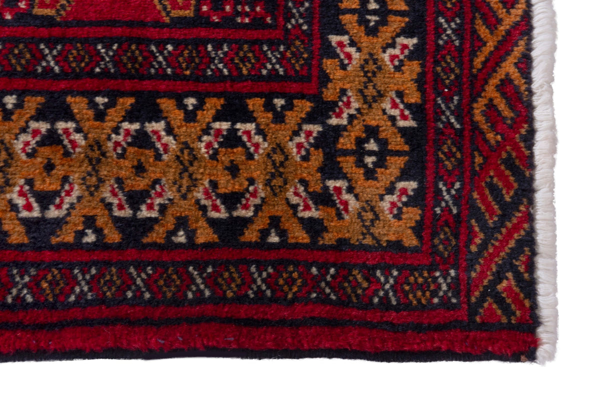 Persian Torkaman accent rug in deep red and ochre, view 5 of 9