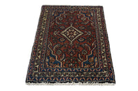 Persian Hamadan accent rug in brick and navy, view 4 of 10