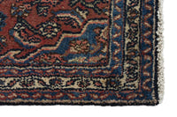 Persian Hamadan accent rug in brick and navy, view 5 of 10