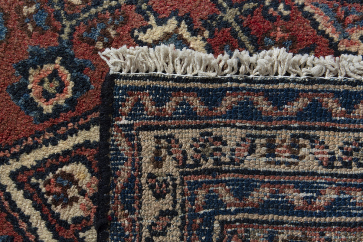 Persian Hamadan accent rug in brick and navy, view 10 of 10