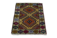Persian Torkaman accent rug in mustard and cream, view 3 of 10