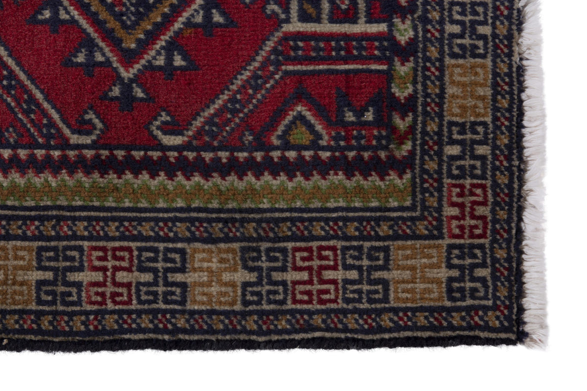 Persian Torkaman accent rug in deep red and tan, view 5 of 9