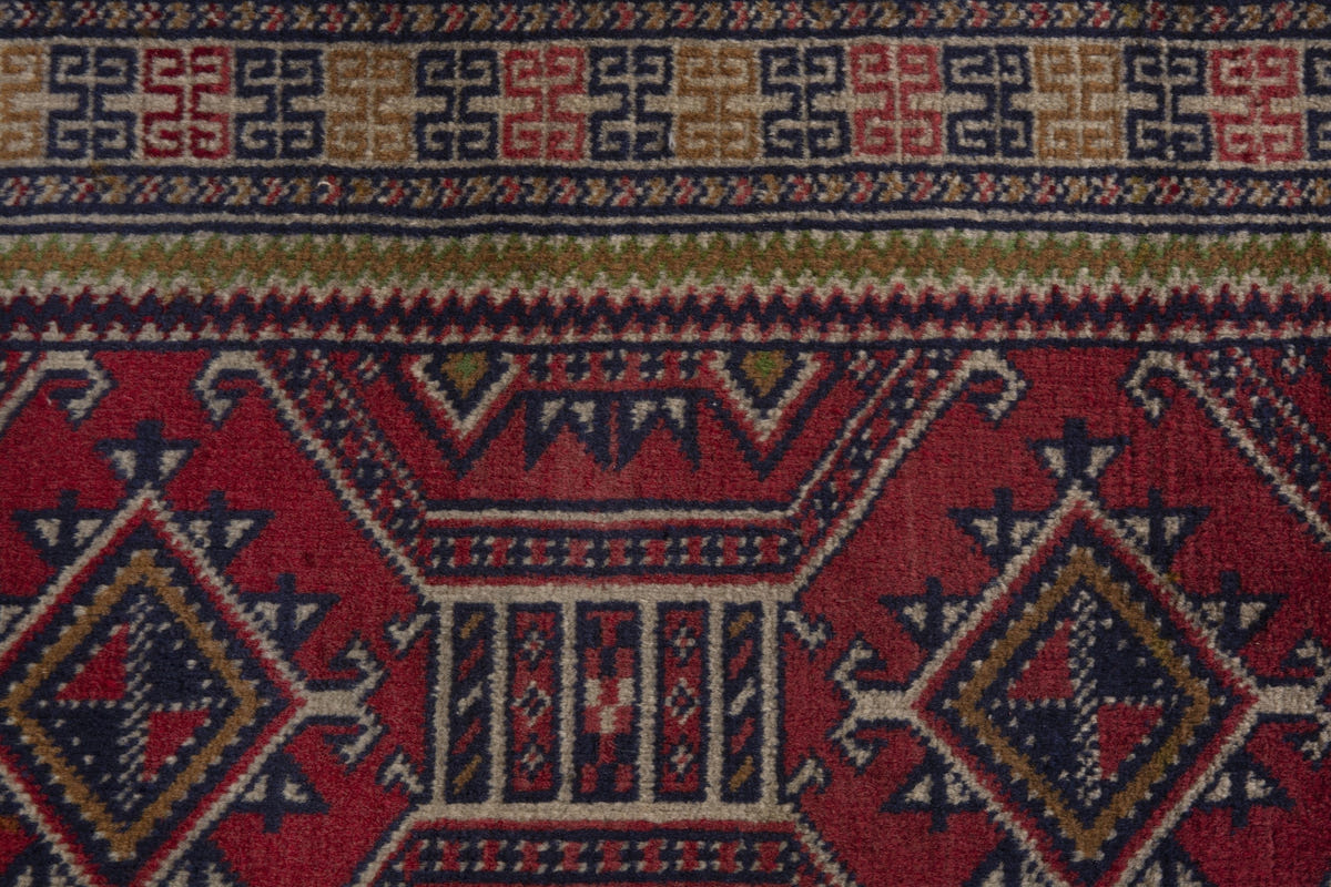 Persian Torkaman accent rug in deep red and tan, view 8 of 9