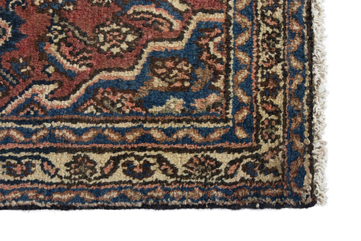 Persian Hamadan accent rug in brick and navy, view 5 of 10
