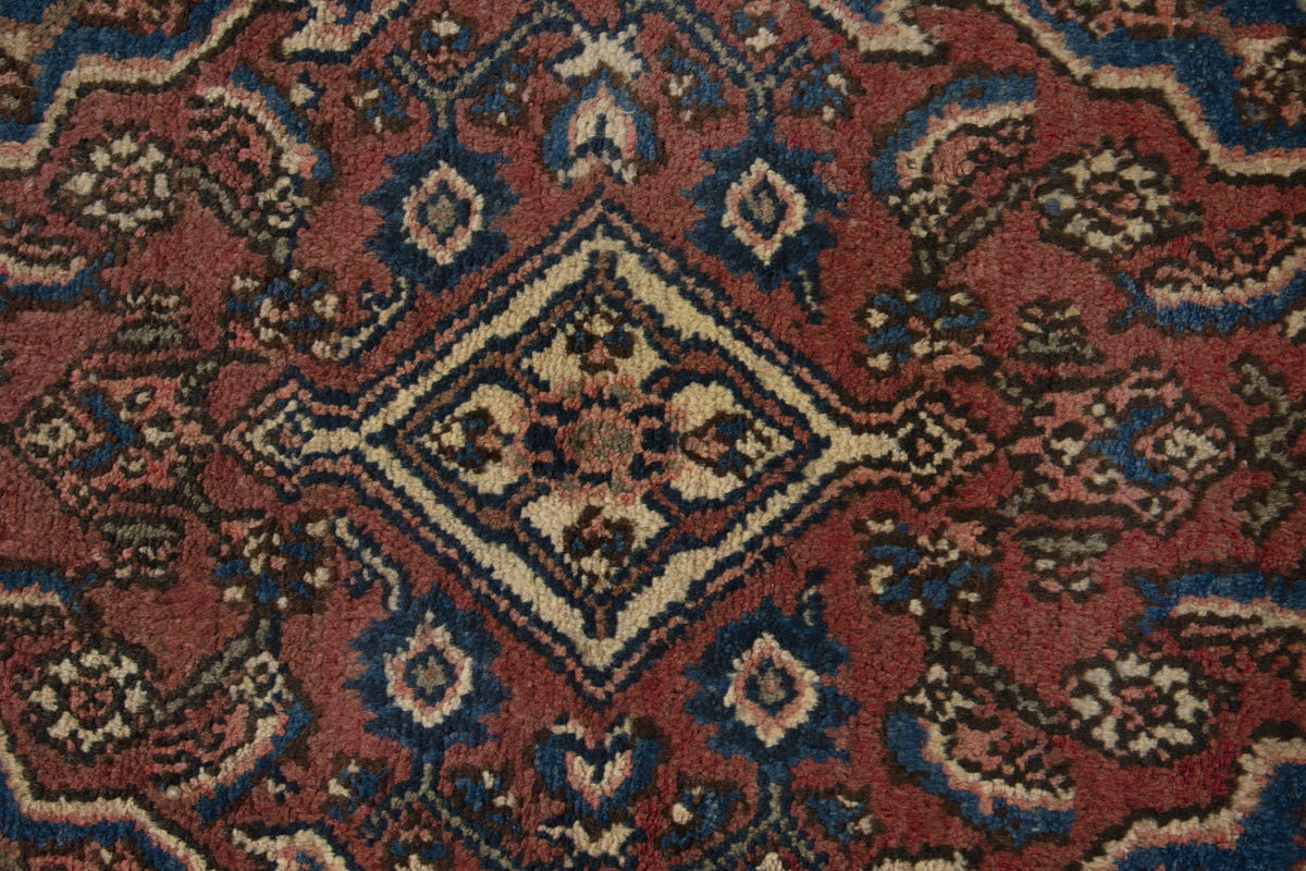 Persian Hamadan accent rug in brick and navy, view 7 of 10