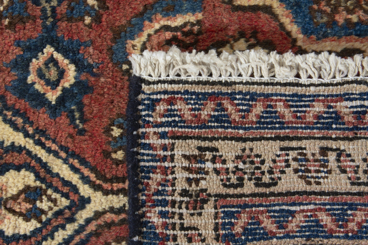 Persian Hamadan accent rug in brick and navy, view 10 of 10