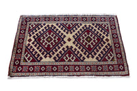 Persian Torkaman accent rug in burgundy and cream, view 3 of 9