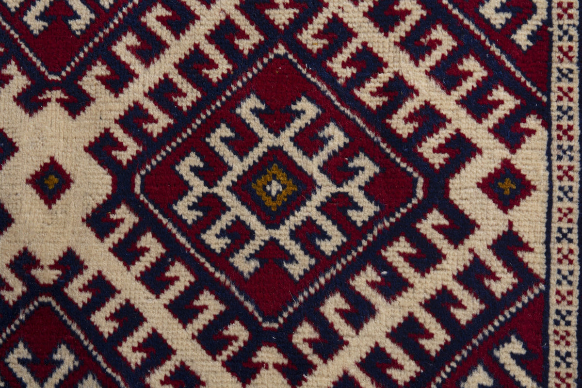 Persian Torkaman accent rug in burgundy and cream, view 7 of 9