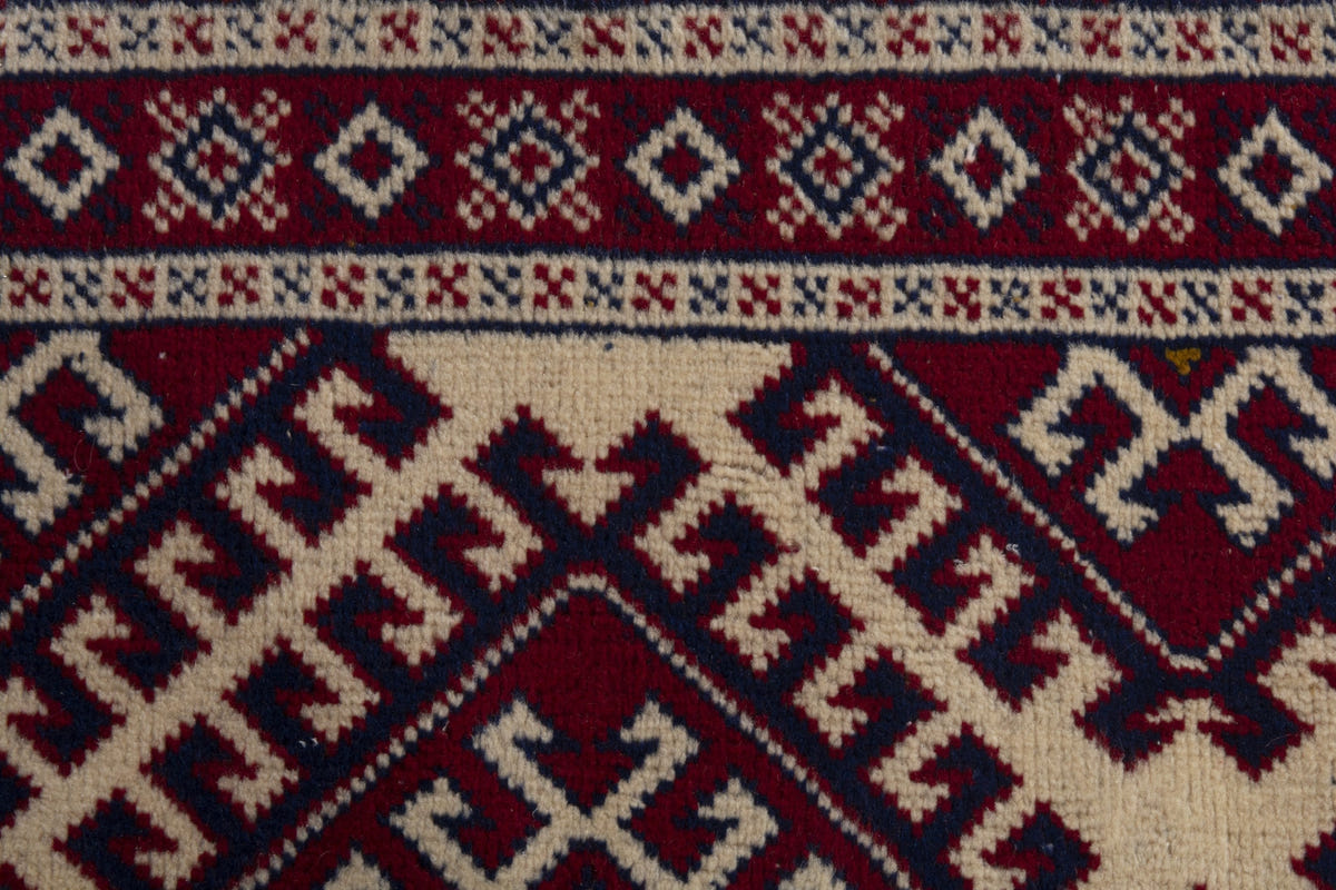 Persian Torkaman accent rug in burgundy and cream, view 8 of 9