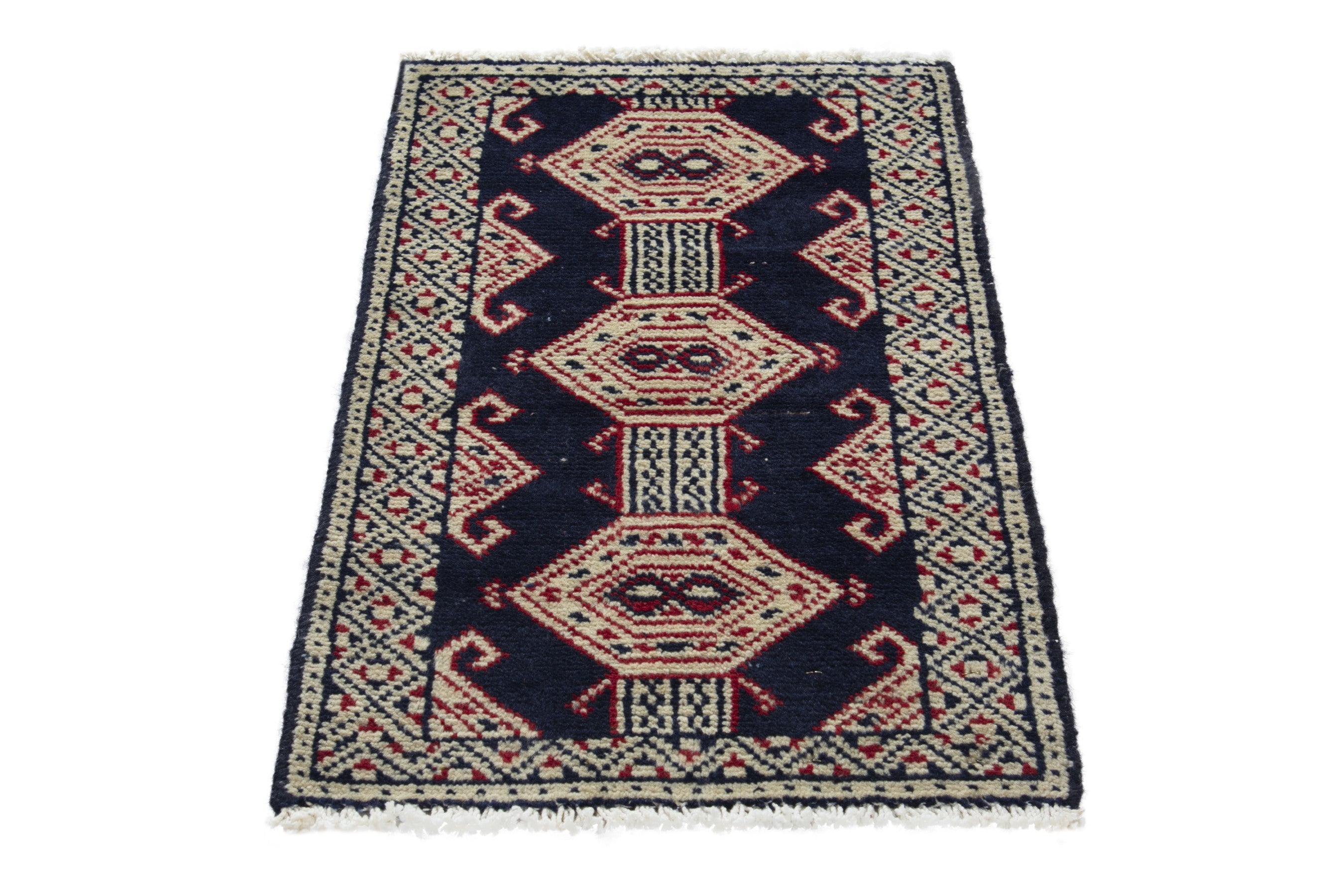 Persian Torkaman accent rug in navy and cream, view 2 of 8