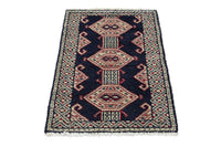 Persian Torkaman accent rug in navy and cream, view 3 of 9