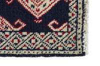 Persian Torkaman accent rug in navy and cream, view 5 of 9