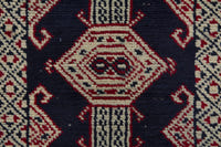 Persian Torkaman accent rug in navy and cream, view 7 of 9