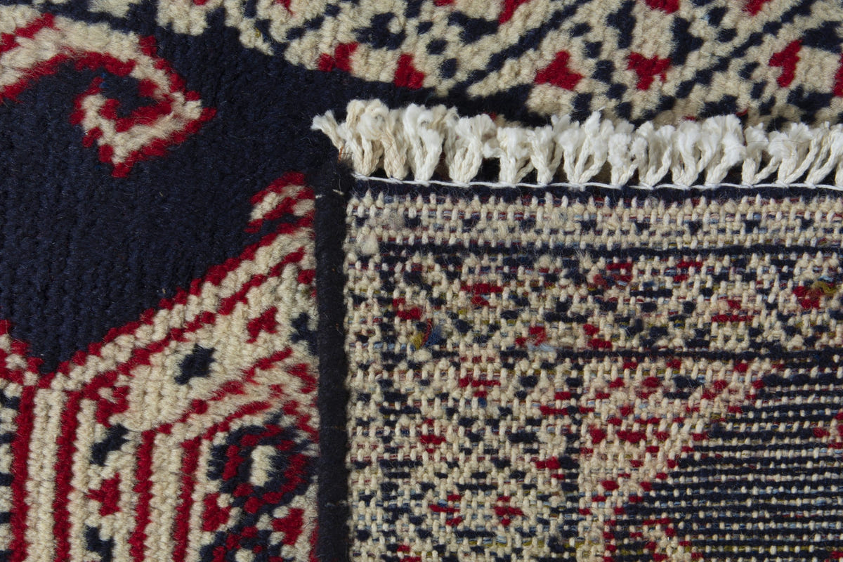 Persian Torkaman accent rug in navy and cream, view 9 of 9