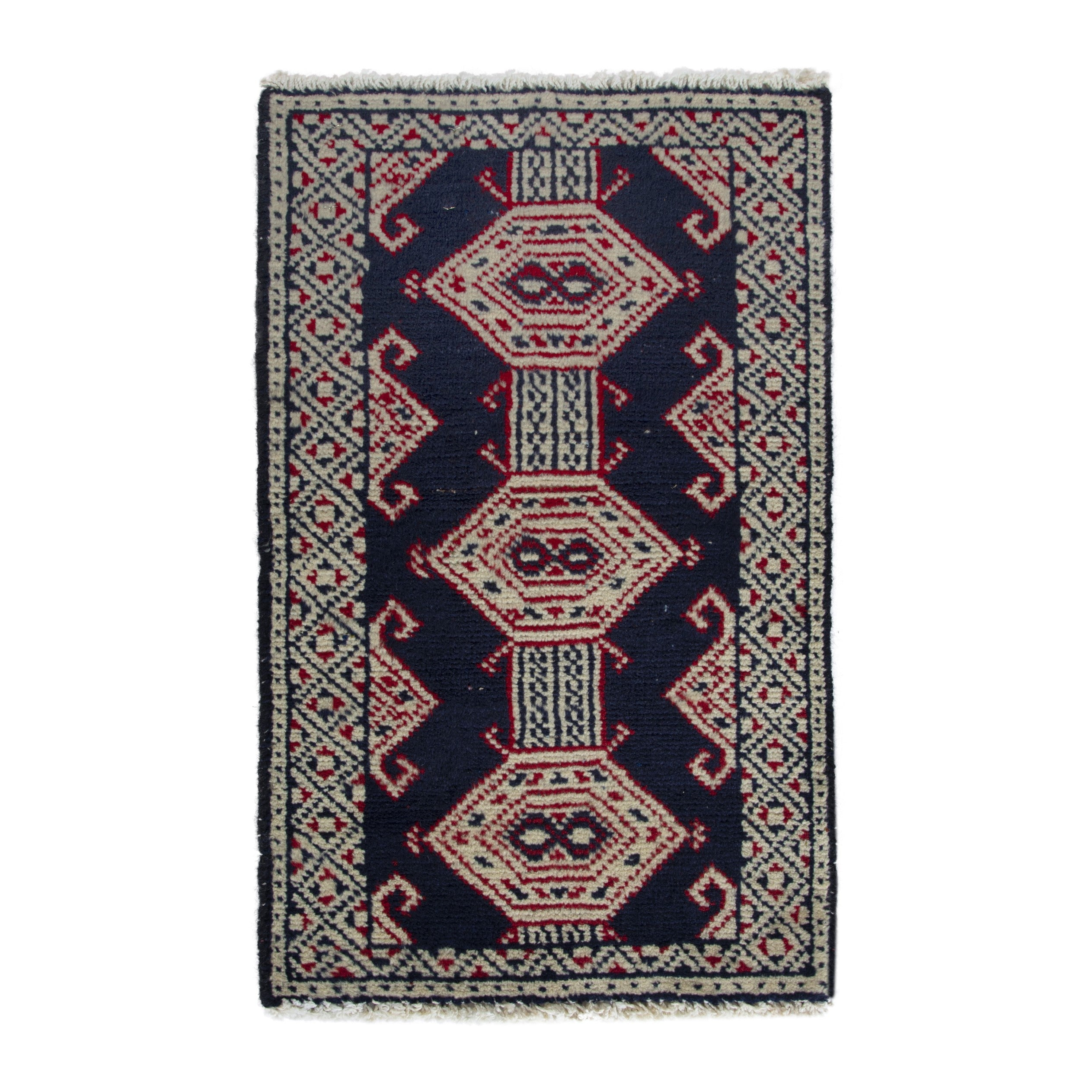 Persian Torkaman accent rug in navy and cream, 1'5" x 2'6"