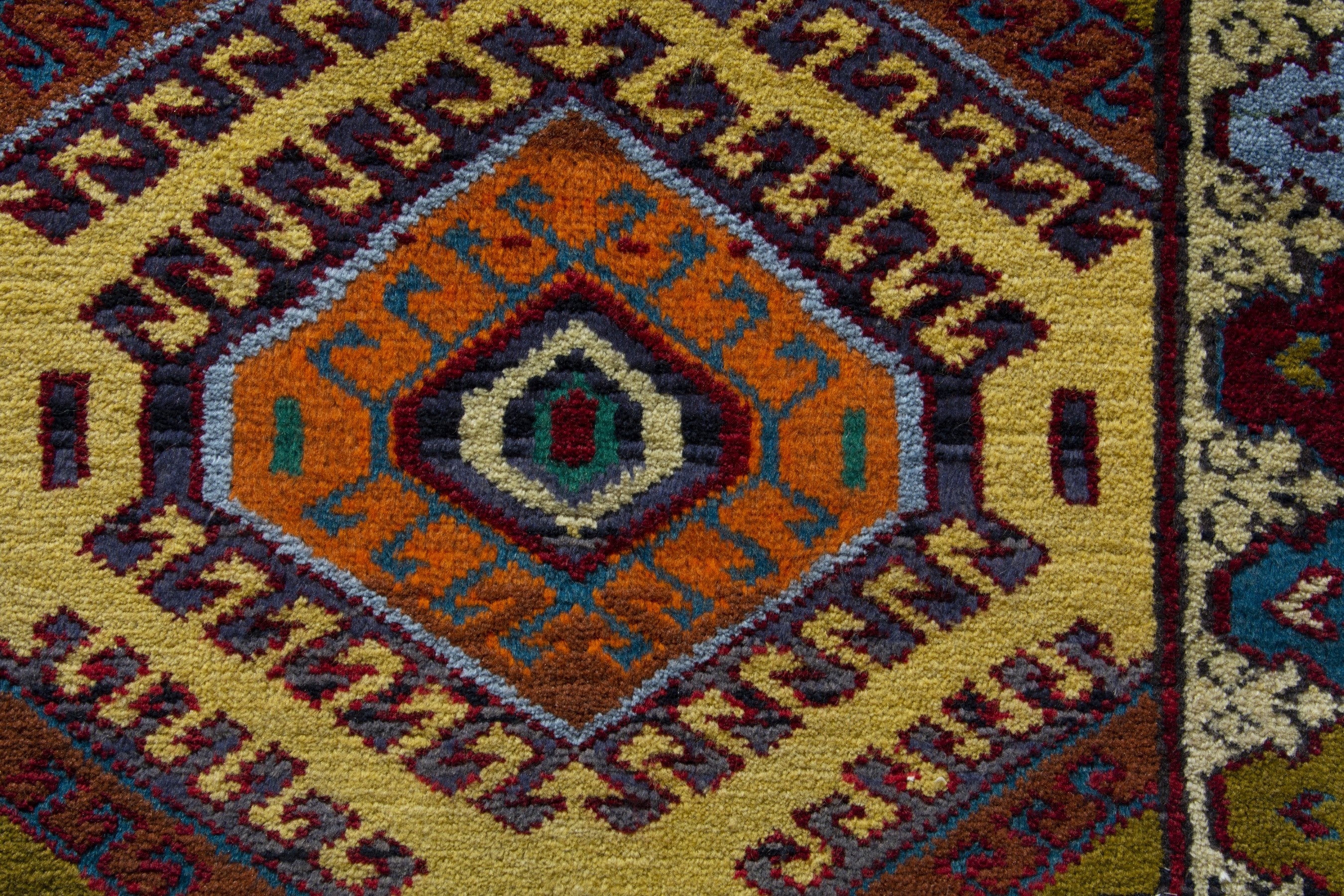 Persian Torkaman accent rug in mustard and cream, view 8 of 9