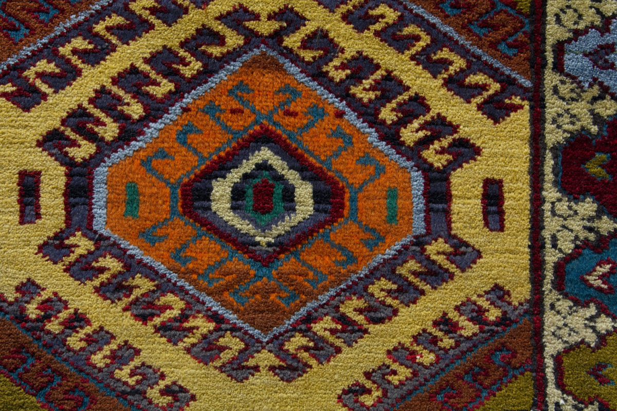 Persian Torkaman accent rug in mustard and cream, view 9 of 10