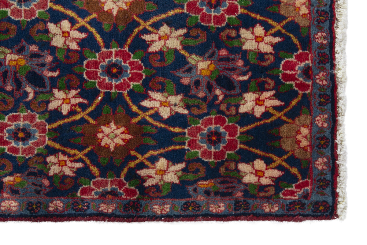Persian Varamin accent rug in navy and deep red, view 5 of 9