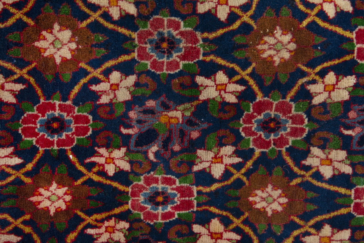 Persian Varamin accent rug in navy and deep red, view 8 of 9
