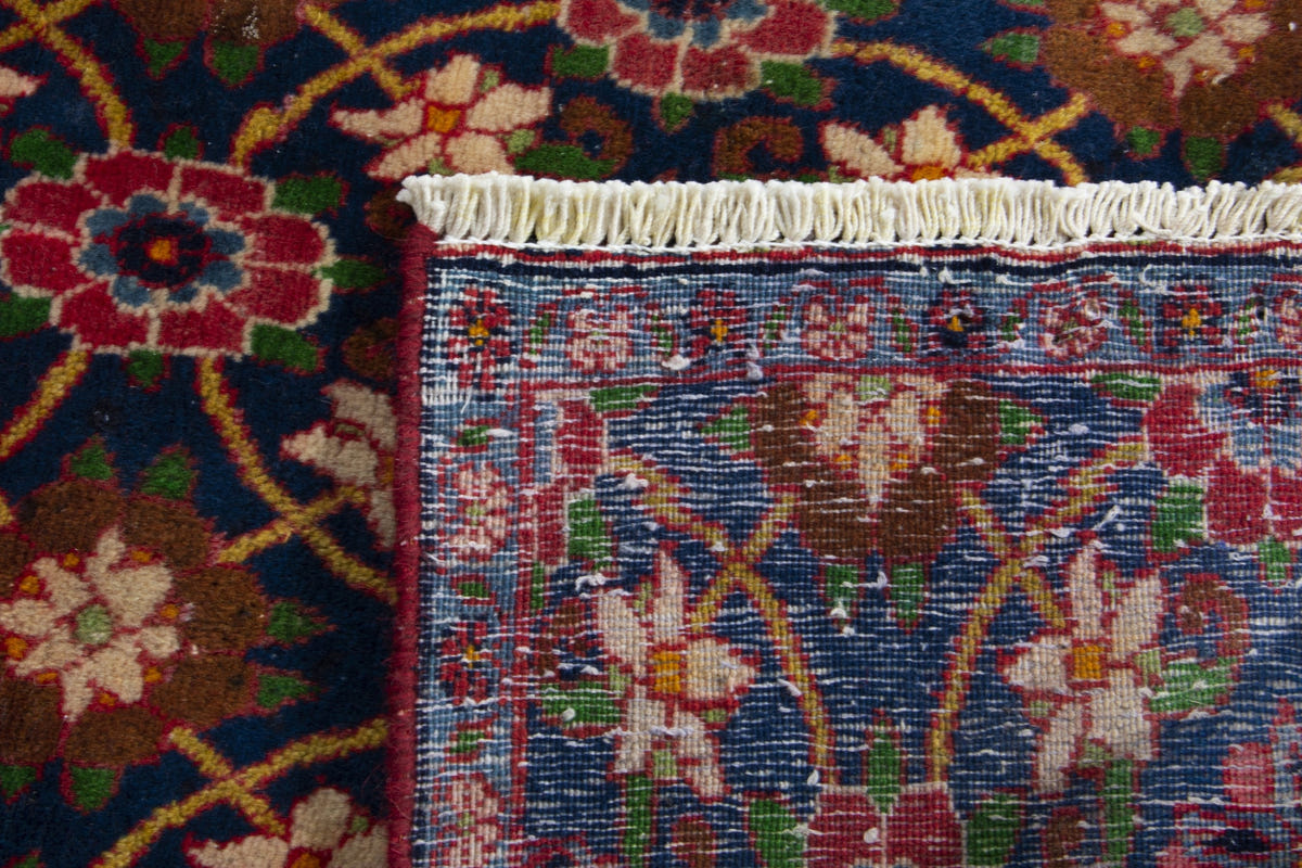 Persian Varamin accent rug in navy and deep red, view 9 of 9