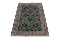 Persian Torkaman accent rug in emerald and cream, view 3 of 9