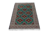 Persian Torkaman accent rug in emerald and cream, view 4 of 9