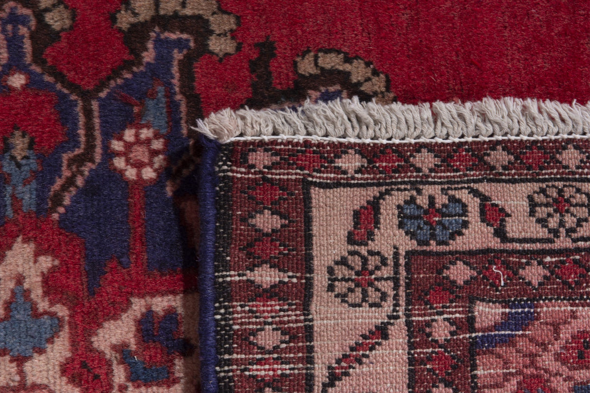 Persian Saveh accent rug in deep red and navy, view 9 of 9