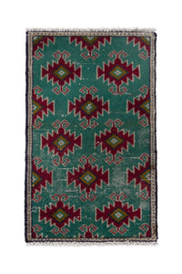 Persian Torkaman accent rug in emerald and deep red, view 2 of 8
