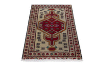 Persian Torkaman accent rug in cream and deep red, view 3 of 8