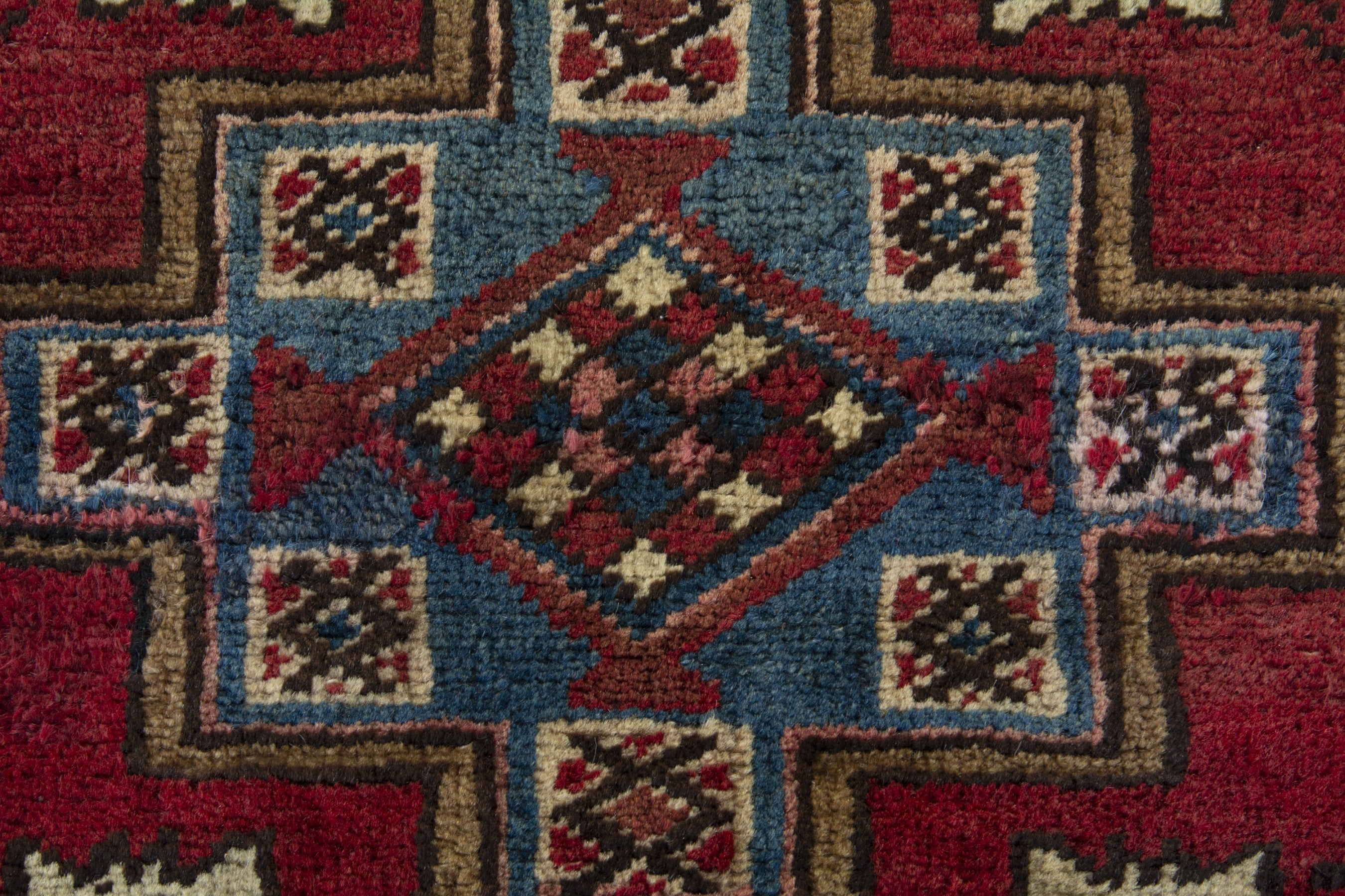 Persian Heriz accent rug in deep red and dusty blue, view 6 of 8